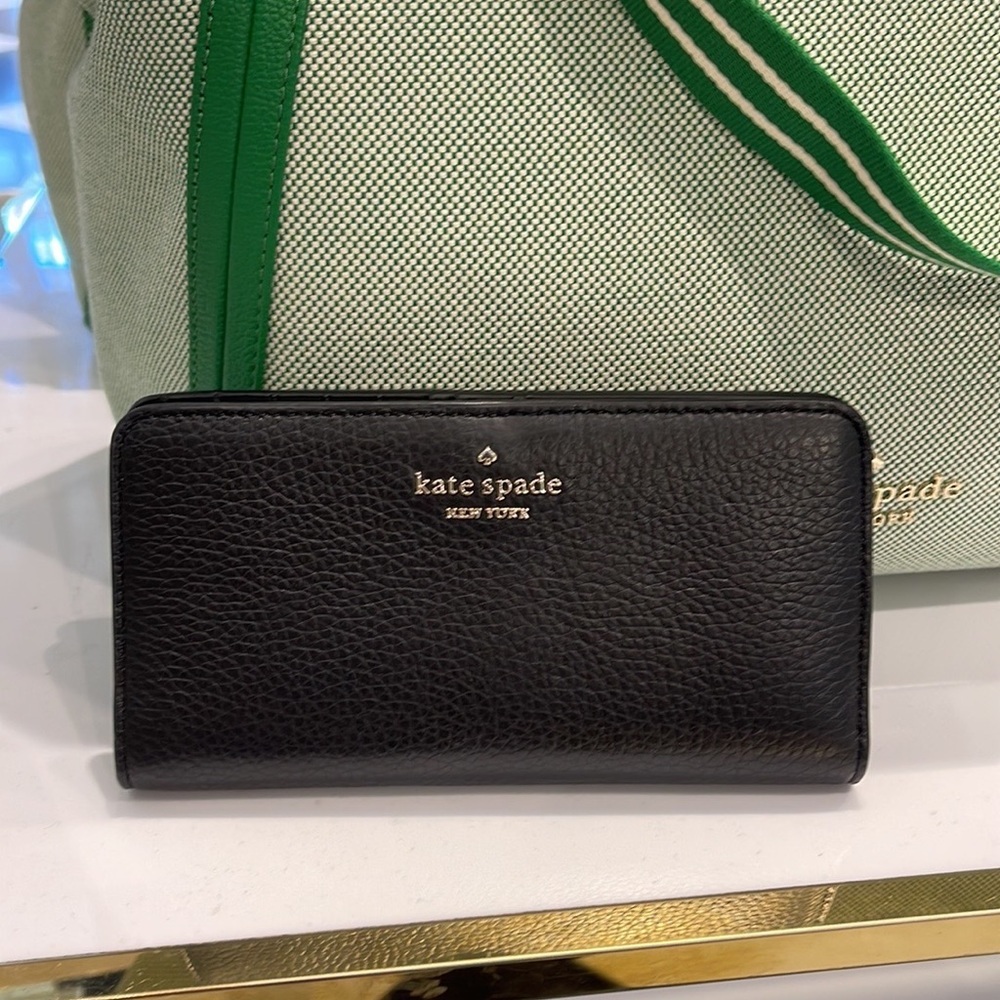 Kate Spade Dumpling Large Slim Bifold Wallet
COLOR: Black - Picture 1 of 16